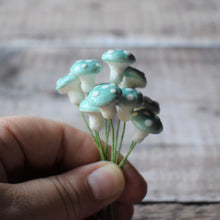 Load image into Gallery viewer, Ten glazed spun cotton mushrooms - 1.4 cm small blue mushrooms on wire stem
