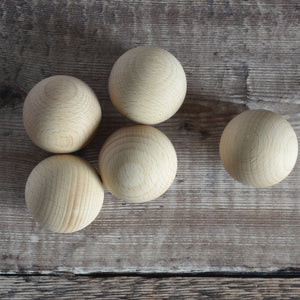 Five solid wooden balls 40mm diameter