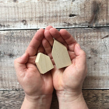 Load image into Gallery viewer, Hands holding wooden house shapes