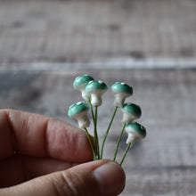 Load image into Gallery viewer, Ten glazed spun cotton mushrooms - 1.1 cm tiny blue mushrooms on wire stem