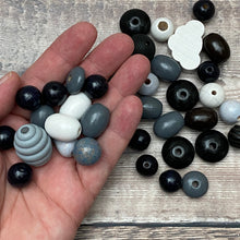 Load image into Gallery viewer, Black and grey beads – scale
