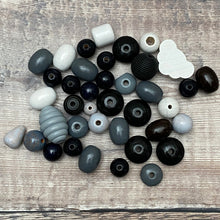 Load image into Gallery viewer, Black and grey beads
