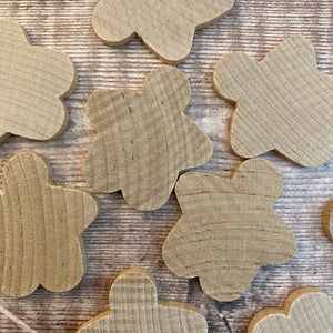 Wooden gingerbread cutout shapes