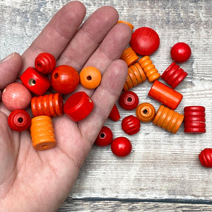 Red and orange beads - scale