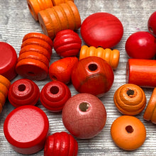 Load image into Gallery viewer, Red and orange beads detail
