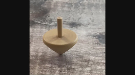 Spinning top in action